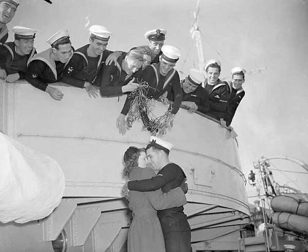 John Webber of HMS Amethyst reunites with his wife Mary and gives her a hug
