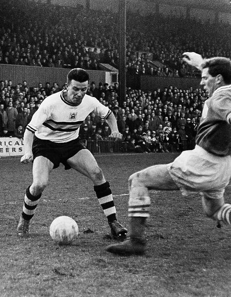Johnney Byrne of Crystal Palace moves on the ball. Circa 1958