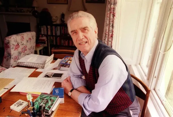 Framed Print : JOHNNY BEATTIE AT HOME sitting at desk Framed Print : JOHNNY BEATTIE AT HOME sitting at desk