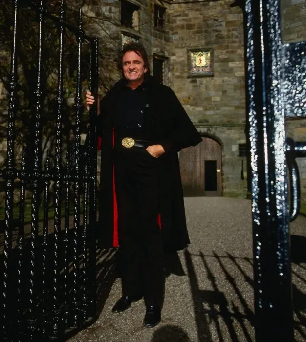 Framed Print : Johnny Cash at gates of castle Framed Print : Johnny Cash at gates of castle