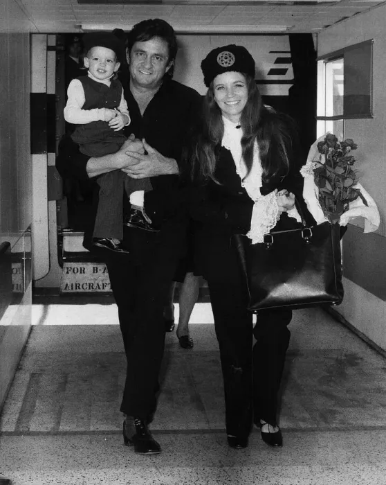 Framed Print : Johnny Cash singer with wife June Carter in London 1971 with son John Cash
