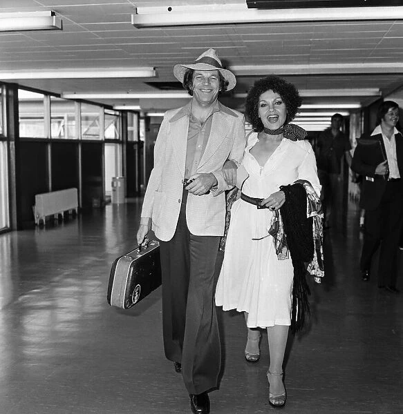 Johnny Dankworth and Cleo Laine at Heathrow Airport. 14th August 1975