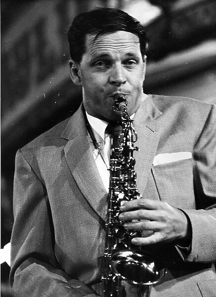 Johnny Dankworth jazz musician with saxophone. 1960