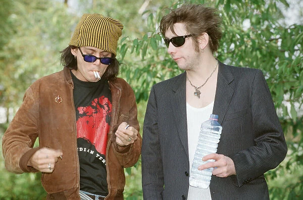 Johnny Depp (left in the hat) and singer Shane MacGowan
