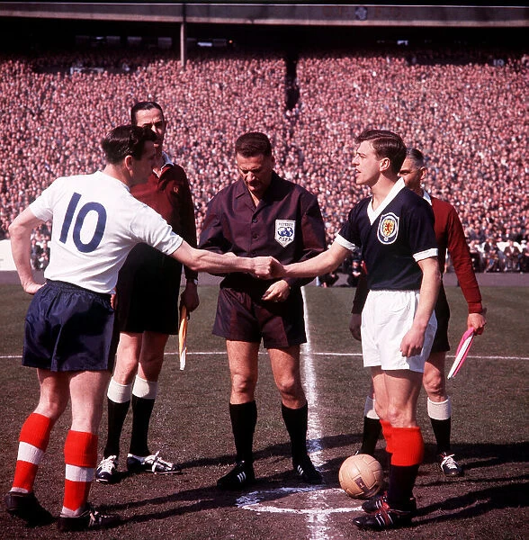 Johnny Haynes Football Scotland V England shaking hands with Eric Caldow