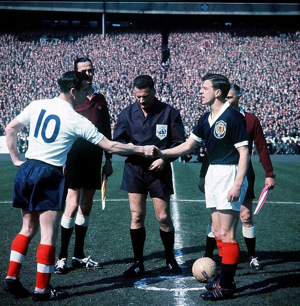 Johnny Haynes Football Scotland V England shaking hands with Eric Caldow April 1962