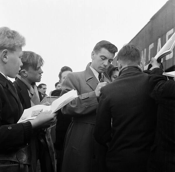 Johnny Haynes of Fulham signing autographs. 31st October 1955