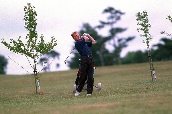 Johnny Herbert Motor Racing F1 July 1997 Playing golf