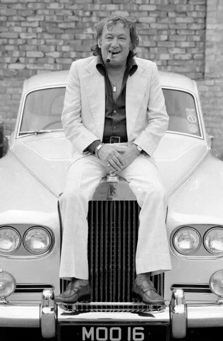 Framed Print : Johnny Speight TV Script Writer - sitting on the bonnet of his Rolls Royce A© Framed Print : Johnny Speight TV Script Writer - sitting on the bonnet of his Rolls Royce A©