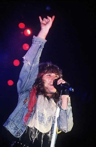 Jon Bon Jovi Pop Singer performing with band at Hammersmith Odeon in 1986