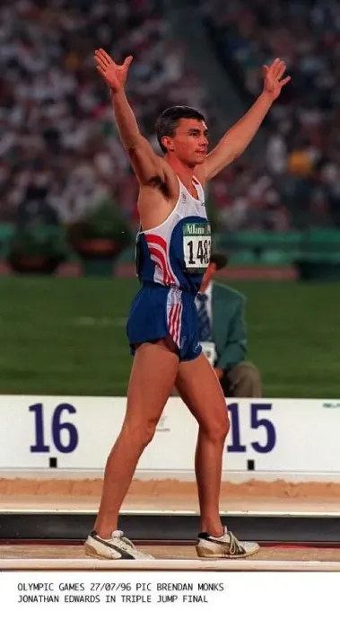Framed Print : Jonathan Edwards during the triple jump in the Olympic Games in Atlanta where he won Framed Print : Jonathan Edwards during the triple jump in the Olympic Games in Atlanta where he won