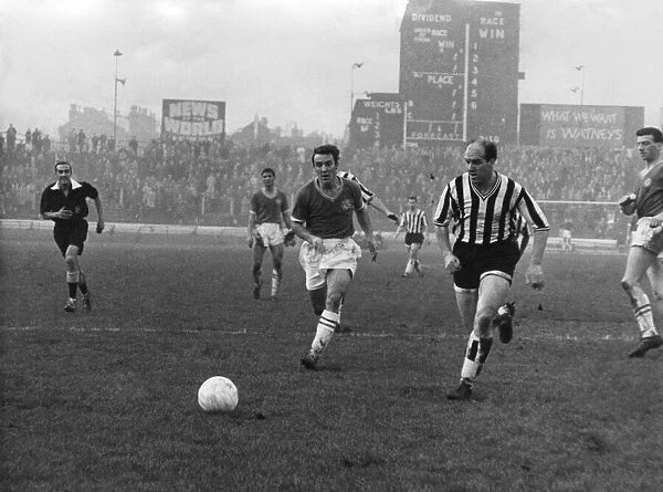 Jones Cheslea Newcastle. Young and old. A race for the ball when Greaves broke throught