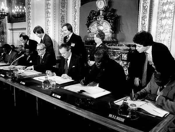 Joshua Nkomo signing the Final Agreement on the future of Rhodesia as the independent