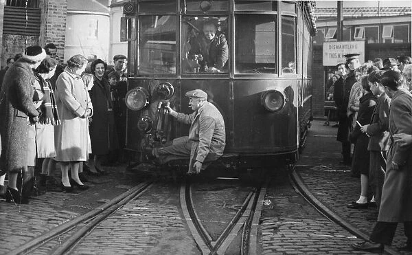 Last journey of the Mumbles train, Swansea, Wales. A maintenance engineer