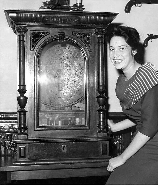 Joyce Brown, 16, pictured at Sunderland with an antique juke box in August 1960