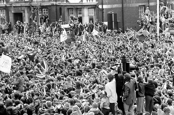 Jubilant West Ham fans outside Newham Town Hall as the West Ham team arrive at the end