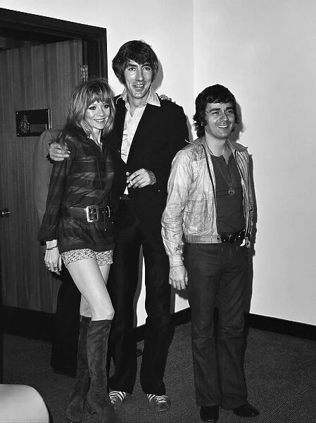 Judy Huxtable, Peter Cook and Dudley Moore pictured at Heathrow airport on their way to