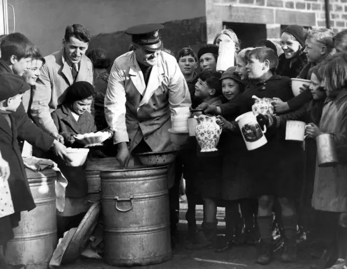 Framed Print : Jugs, basins and cans were perssed into service when the Salvation Army Men