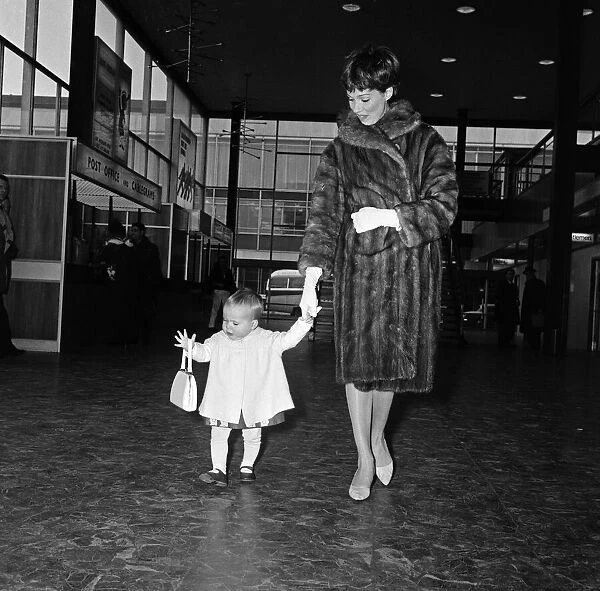 Julie Andrews and her daughter Emma leave London Airport for New York