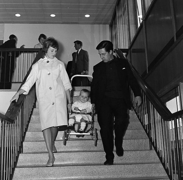 Julie Andrews at London Airport with her daughter Emma and husband Tony Walton