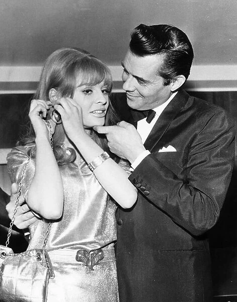 Julie Christie Actress pictured with Dirk Bogarde Actor at the Grosvenor House Hotel