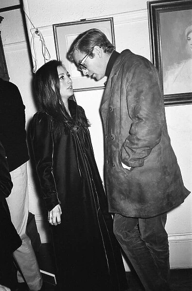 Julie Felix and Michael Caine at a party. 22nd January 1967