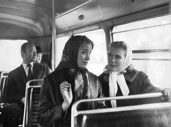 Juliet Mills sitting on bus with fellow actress Julia Lockwood - November 1960