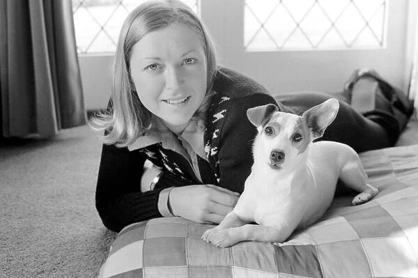 Show jumper Marion Mould with her pet dog. January 1975 75-00377