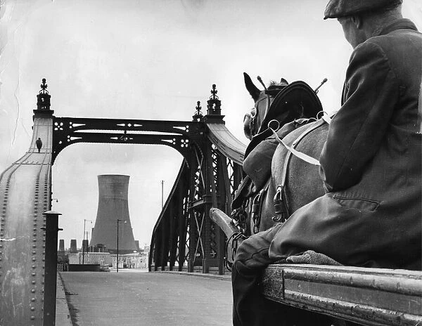 June 1964. The tower of the Sculcoates power station is framed by the Clough Road