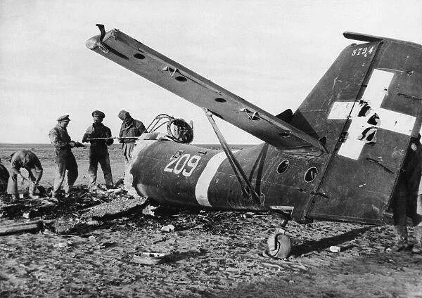Junkers bomber destroyed by R. A. F Hurricane on the Libyan battlefront