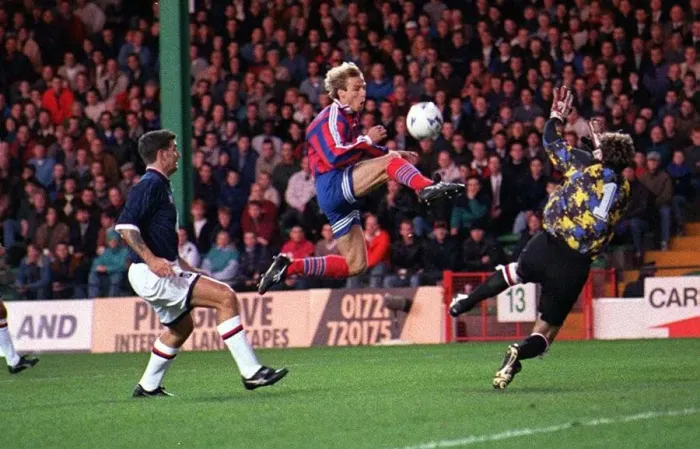Framed Print : Jurgen Klinsmann scores for Bayern Munich against Raith Roversat during a UEFA Cup mnatch