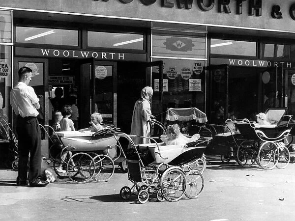Just a few of Kirkbys thousands of prams and pushchairs, outside Woolworth