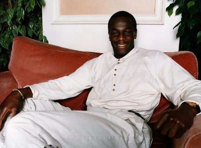 Framed Print : Justin Fashanu of Hearts relaxing in his new flat which costs 1000 per week to rent Framed Print : Justin Fashanu of Hearts relaxing in his new flat which costs 1000 per week to rent