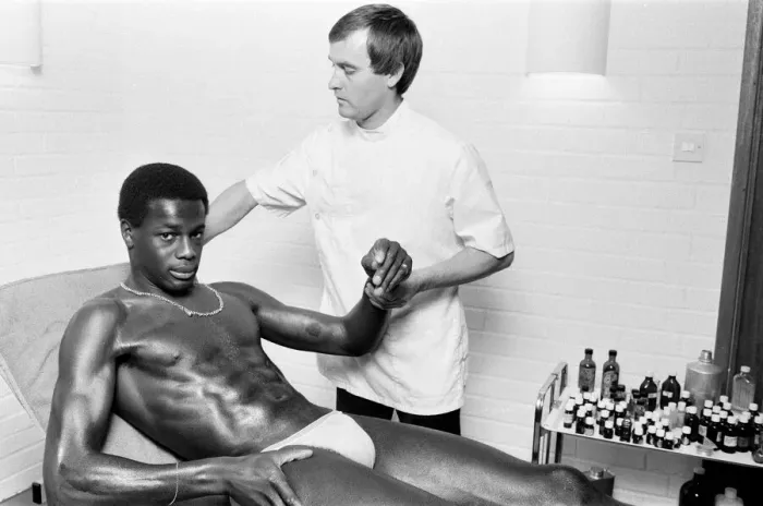 Framed Print : Justin Fashanu, Nottingham Forest Football Player, on the treatment table Framed Print : Justin Fashanu, Nottingham Forest Football Player, on the treatment table