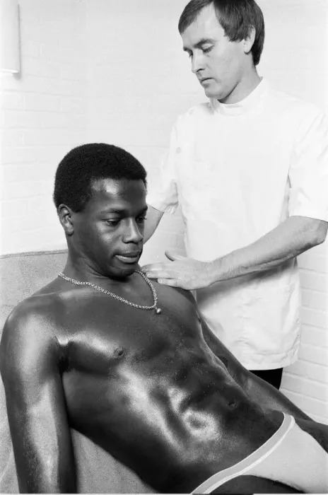 Framed Print : Justin Fashanu, Nottingham Forest Football Player, on the treatment table