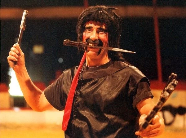 karl Orry of the Russian State Circus getting in some practice with his knives