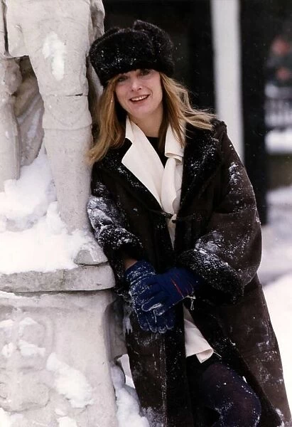 Kate Buffery actress in the snow at Soho Square to launch The Orchid House Channel 4s