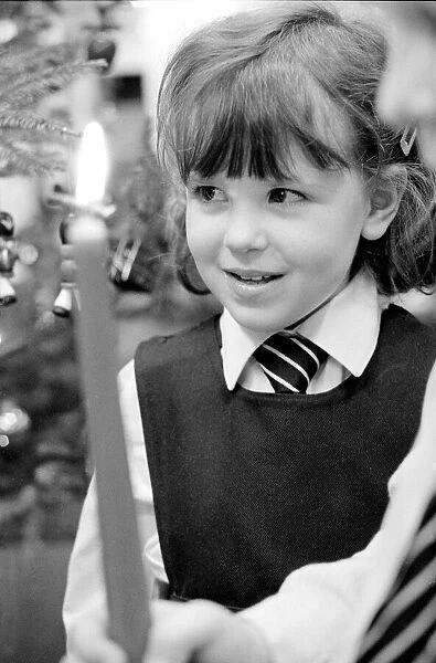 Kate Hurst (5) during a Christmas carol concert at Victoria Park Infant School - Bristol