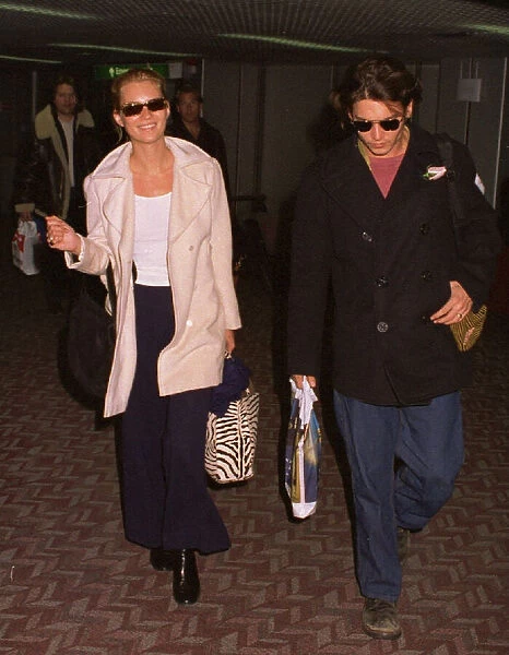 Kate Moss Model arrives at Heathrow Airport with her boyfriend Johnny Depp Actor