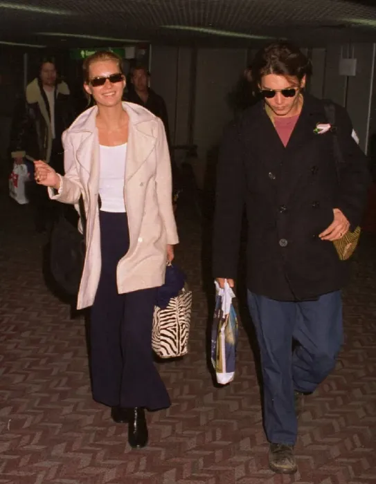 Framed Print : Kate Moss Model arrives at Heathrow Airport with her boyfriend Johnny Depp Actor Framed Print : Kate Moss Model arrives at Heathrow Airport with her boyfriend Johnny Depp Actor