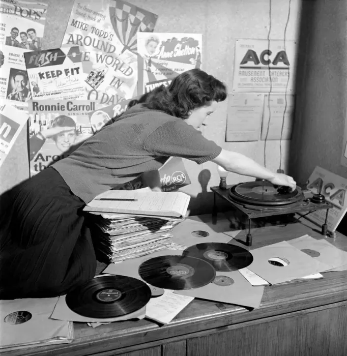 Framed Print : Kathleen Craig juke box queen who selects records for jukeboxes. 1956 A516-013 Framed Print : Kathleen Craig juke box queen who selects records for jukeboxes. 1956 A516-013