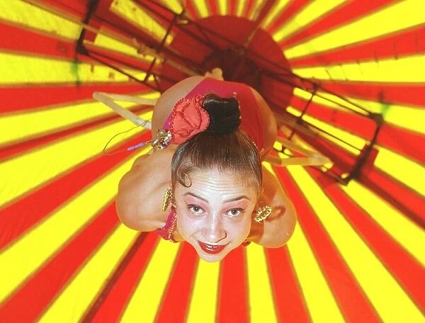 Katy Baldock Circus Performer September 1999 training practising on trapeze in