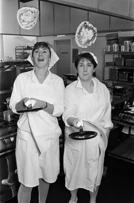 Framed Print : Kay Harvey celebrates Shrove Tuesday in traditional style - by tossing a pancake