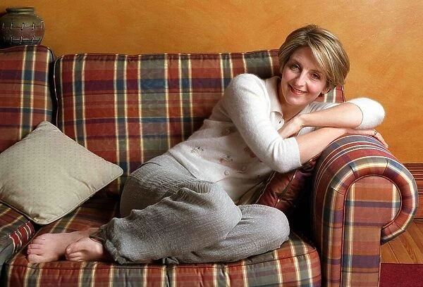 Kaye Adams tv presenter at home December 1999 couch sofa