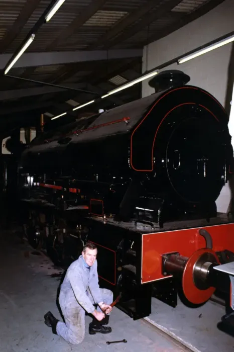Framed Print : Keith McNulty, Hon. Treasurer with a Bagnall 0-6-0 locomotive built in 1950 at the George