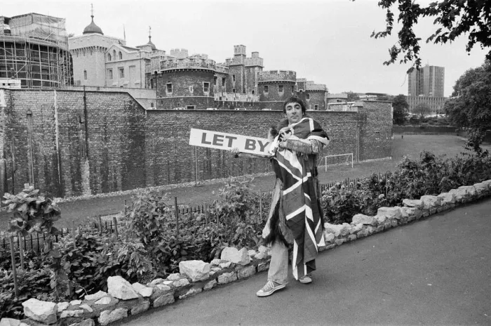 Framed Print : Keith Moon, drummer with British rock group The Who, draped in the Union Jack flag
