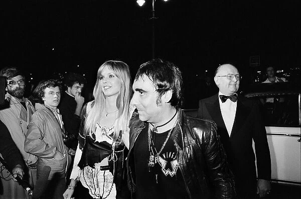 Keith Moon, drummer of the British rock group The Who, attending the the premier of