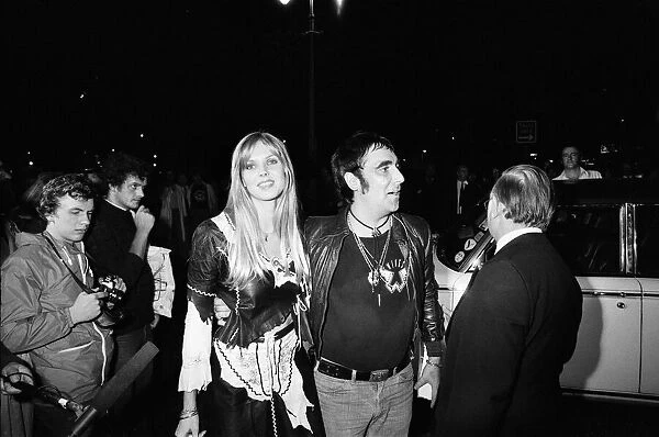 Keith Moon, drummer of the British rock group The Who, attending the premier of the new
