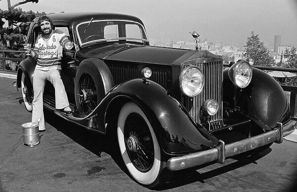 Keith Moon, drummer of The Who rock group and with his 1929 built Rolls Royce Phantom car