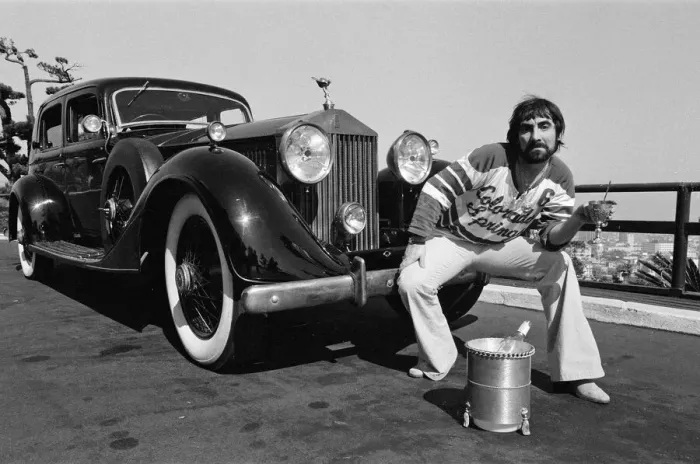 Framed Print : Keith Moon, drummer of The Who rock group, with his 1929 built Rolls Royce car in